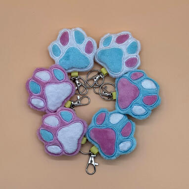 Pride paw plush bag charms (trans pride version)